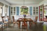 The home has so many built-in cubbies, cabinets and shelves that furniture needs are minimal. The dining room includes a china cabinet and buffet. There is even storage between rooms. White and traditional window trim helps the home feel larger and lends a cozy feel, playing off the concrete floors. (Benjamin Benschneider/The Seattle Times)