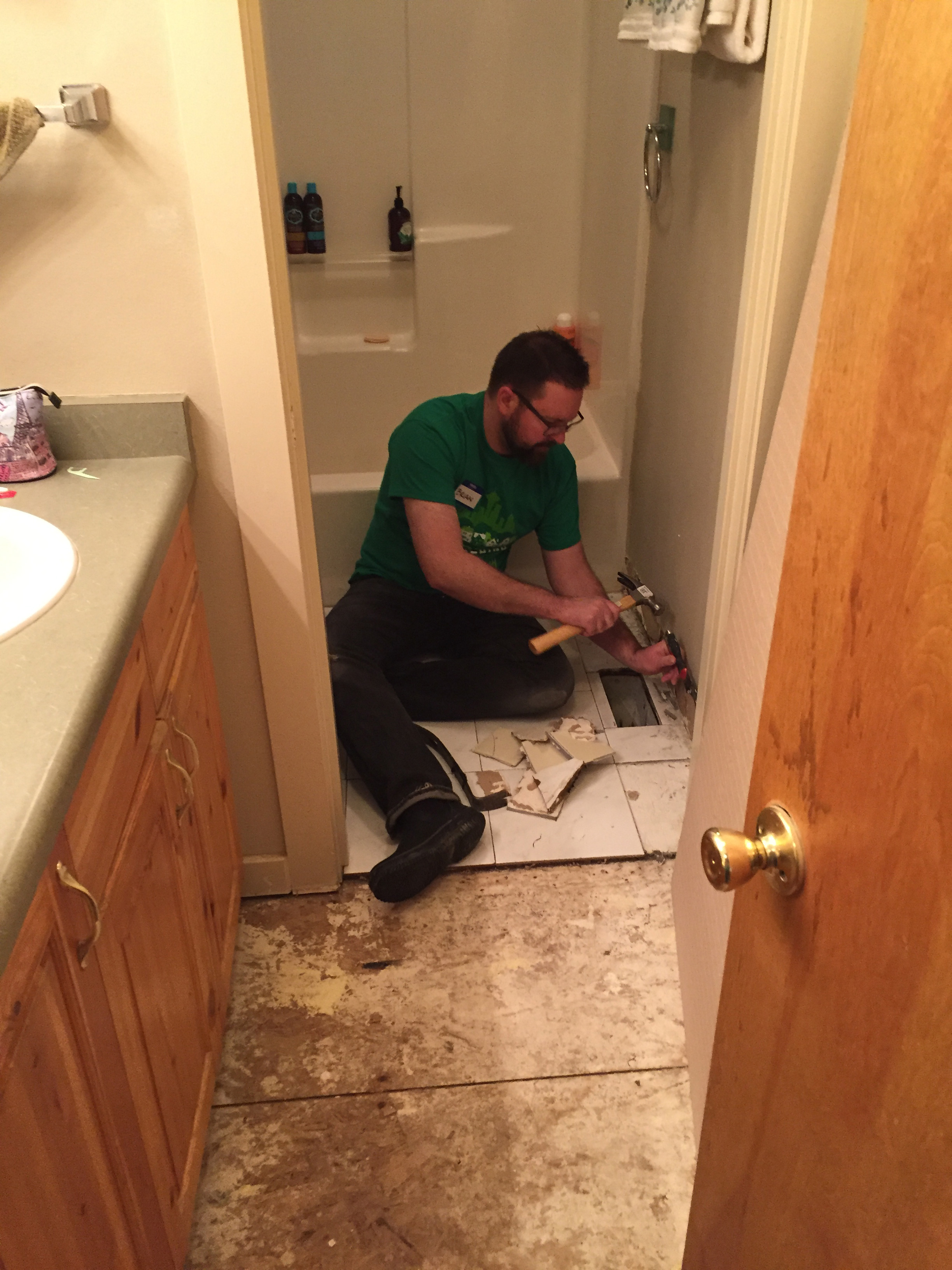 Rebuilding Together Seattle: Board & Vellum Volunteers – Brian Demo'ing Tile