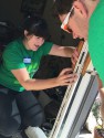 Rebuilding Together Seattle: Board & Vellum Volunteers – Hayley Works on the Door
