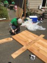 Rebuilding Together Seattle: Board & Vellum Volunteers – Katie Working on the Gate