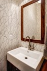 Seattle Box Remodel – Board & Vellum – Wallpaper in the powder room.