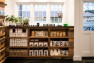 Salvaged Wood Display Shelves at Entry – Ada’s Technical Books & Café – Retail Design – Board & Vellum