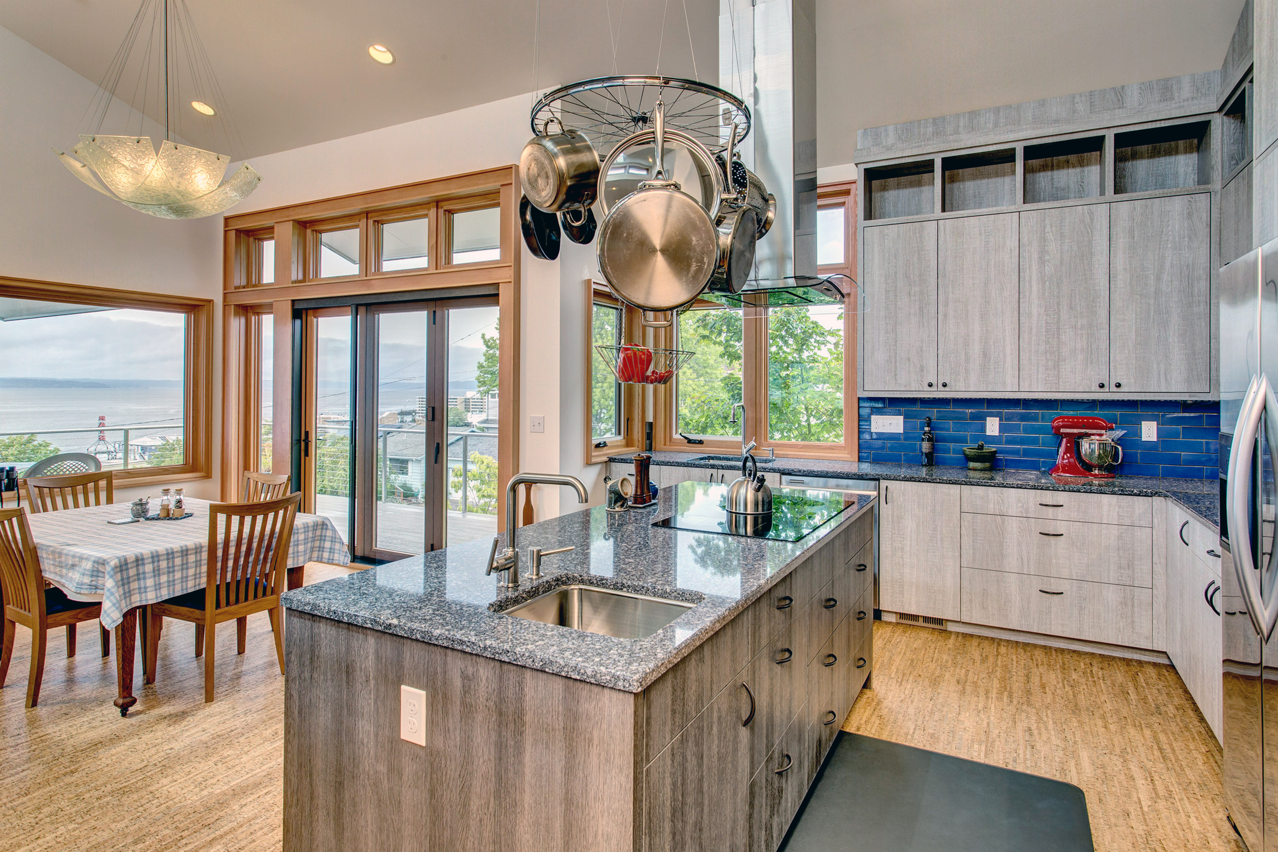 Ballard Locks Residence: Green Home Remodel – Folding doors off the kitchen to the deck.