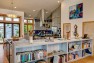 Ballard Locks Residence: Green Home Remodel – Looking across the stairwell to the kitchen.