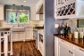 Classic Kitchen: Laurelhurst Kitchen Remodel – Built-In Wine Storage and Buffet Counter in Dining Room