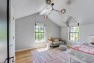 Child's bedroom with vaulted ceiling. – Remodel in a Tudor-style home: Morning Light Master – Board & Vellum