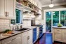 Seattle Box Remodel – Board & Vellum – Kitchen with floating shelves.