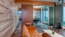 Capital Pacific – Commercial Office Design – Lobby space with leather and wood details.