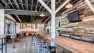 Lowercase Brewing Taproom – Looking down the bar, towards the cushioned 