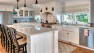 Traditional kitchen with farmhouse details and white cabinets. – Gut and Remodel of a 1960s-era Home – Sound Landing – Board & Vellum