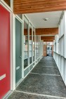 Capital Pacific – Commercial Office Design – Entrance off a covered outdoor walkway.