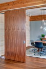 Capital Pacific – Commercial Office Design – Sliding wood panels.
