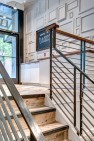 Oasis Tea Zone Capitol Hill – Metal railing with wood cap on stairs. – Retail Café Design