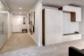 Split Level Remodel – Sammamish Split by Board & Vellum – Glossy white cabinets.