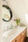 Under the Eaves – Second Story Remodel – Tucking a master bath vanity under a sloping ceiling.