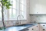 Kitchen Remodel with Classic Charm – Madrona Kitchen – Board & Vellum – Carrara marble tile backsplash in the kitchen.