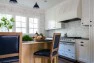 Kitchen Remodel with Classic Charm – Madrona Kitchen – Board & Vellum – Cushioned bar stools at an eat-in kitchen island.