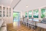 A bright eating nook off the kitchen with a view of the yard. – Addition on Three Floors – Board & Vellum