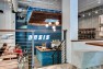 Oasis Tea Zone Capitol Hill – Stairs down to the POS. – Retail Café Design