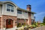 Eyebrow dormer over the front entry. – Gut and Remodel of a 1960s-era Home – Sound Landing – Board & Vellum