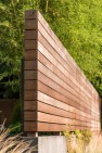 Fence with horizontal wood planks wrapping corner. – Urban Yard at The Seattle Box – Board & Vellum