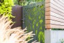 Front gate with cut steel pattern. – Urban Yard at The Seattle Box – Board & Vellum