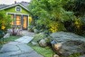 A stone garden path with large accent boulders. – Urban Yard at The Seattle Box – Board & Vellum