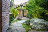 A paver path cuts through the garden to the guest cottage. – Urban Yard at The Seattle Box – Board & Vellum