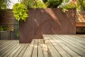 Corten steel planters with a wood deck. – Urban Yard at The Seattle Box – Board & Vellum