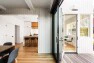 Main-level kitchen addition built out from the existing home.