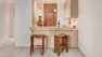 Two bar stools at the counter in this Petite Condo Kitchen, by Board & Vellum.