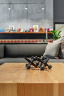 Giant, decorative jacks adorn a coffee table.