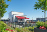 A rooftop bar and roof garden on an apartment building.