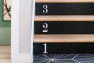 A creative cost-saving tip for your commercial space: fun, adhesive number decals.