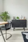 A dining area in a model unit at an apartment building, the Lucille on Roosevelt.