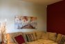 A view of an ADU living room before a remodel to open up the kitchen.