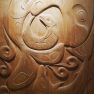 Native American wood relief carving.