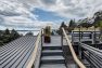 A few last steps up to reach the small roof deck perfect for enjoying views of the water. — Cloverdale House – Second Story Addition by Board & Vellum