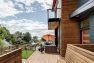 With a large, wrap-around front porch, there are multiple outdoor spaces to enjoy. — Cloverdale House – Second Story Addition by Board & Vellum