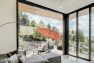 Floor-to-ceiling sliding glass panels completely open the living room to the deck. — Cloverdale House – Second Story Addition by Board & Vellum