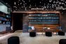 The lobby passageway at the Lucille on Roosevelt: view towards the builtin bookshelves. – Interior design by Board & Vellum