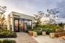 The penthouse of the club room amenity space as viewed from the rooftop garden at the Lucille on Roosevelt. – Board & Vellum