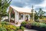 A glamping tent is nestled among beautiful rooftop gardens at the Lucille on Roosevelt.