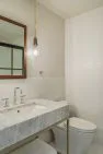 Powder room at the Condo at the Market – Modern Condo – Board & Vellum