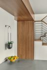Walnut cabinet at and casework details at the Condo at the Market – Modern Condo – Board & Vellum
