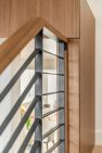 Railing and cabinet details meet at the Condo at the Market – Modern Condo – Board & Vellum