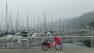 Looking out over a Seattle marina in September 2020 during the wildfires. There's low smoke obscuring the view.