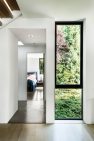 Where windows don’t take in water and mountain views, they are filled with the green of screening foliage and a vegetated roof over the lower level. – Laurelhurst Landscape at the Tree+House – Board & Vellum