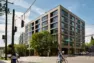 Corner of Tanager Apartments at 14th Avenue and East Union Street with ground-floor commercial storefronts. – Tanager Apartments – Board & Vellum
