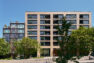 Tanager Apartments viewed along East Union Street with new street trees and planters. – Tanager Apartments – Board & Vellum
